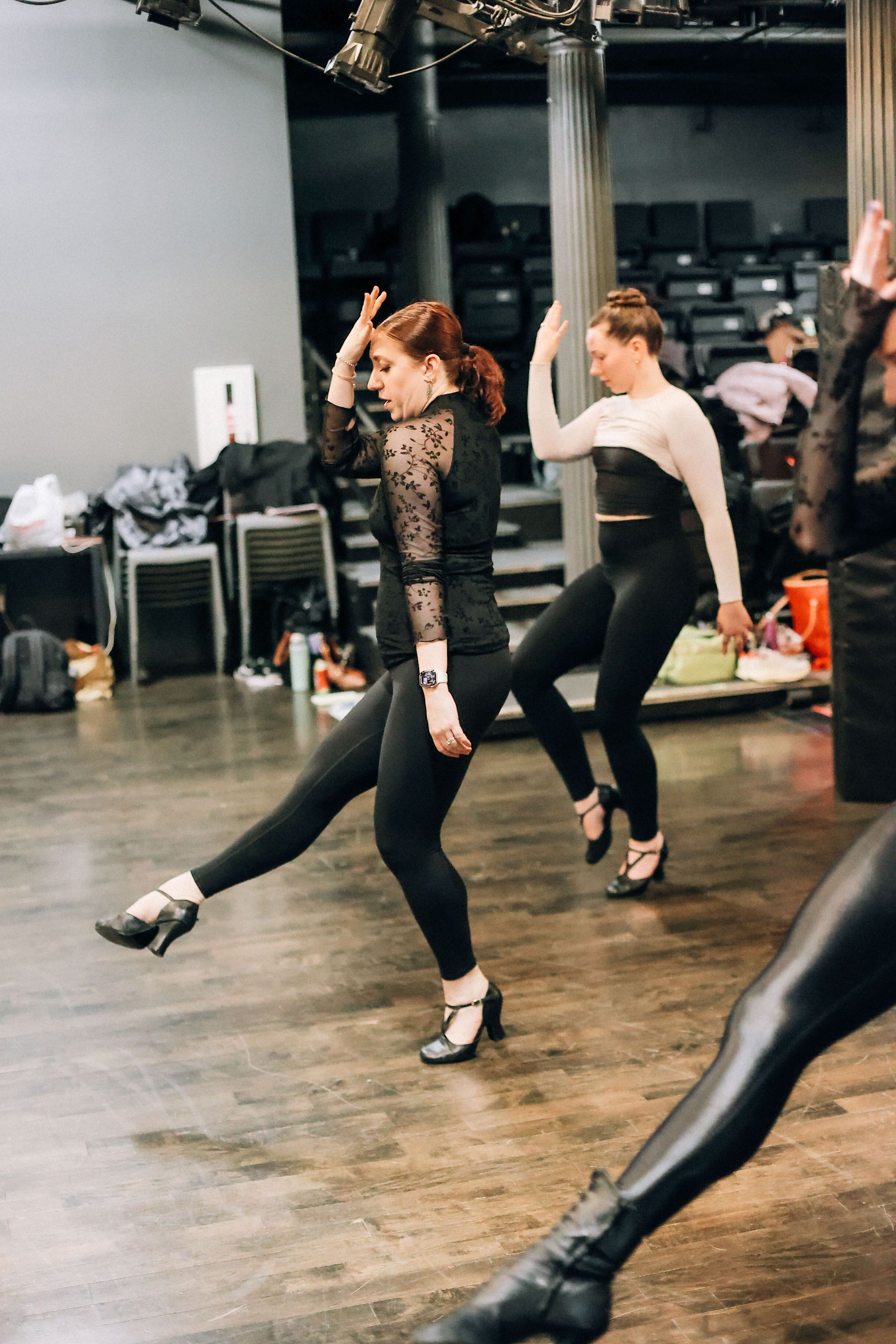 PDC instructor demonstrating precision dance technique during class